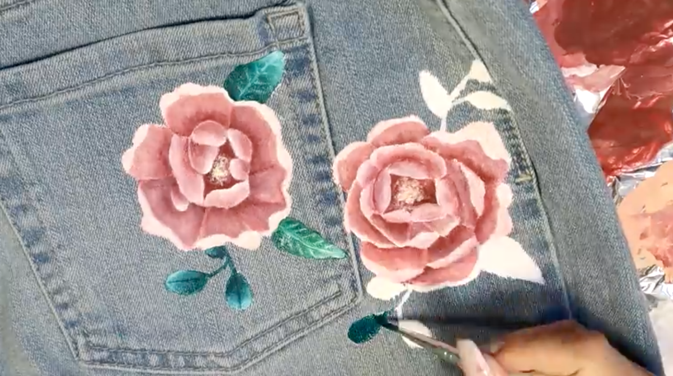 flowers painted on jeans
