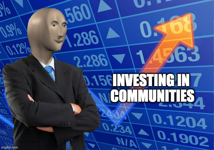 An image of a mannequin dressed in a suit looking at stocks next to white text that says "Investing in Communities"