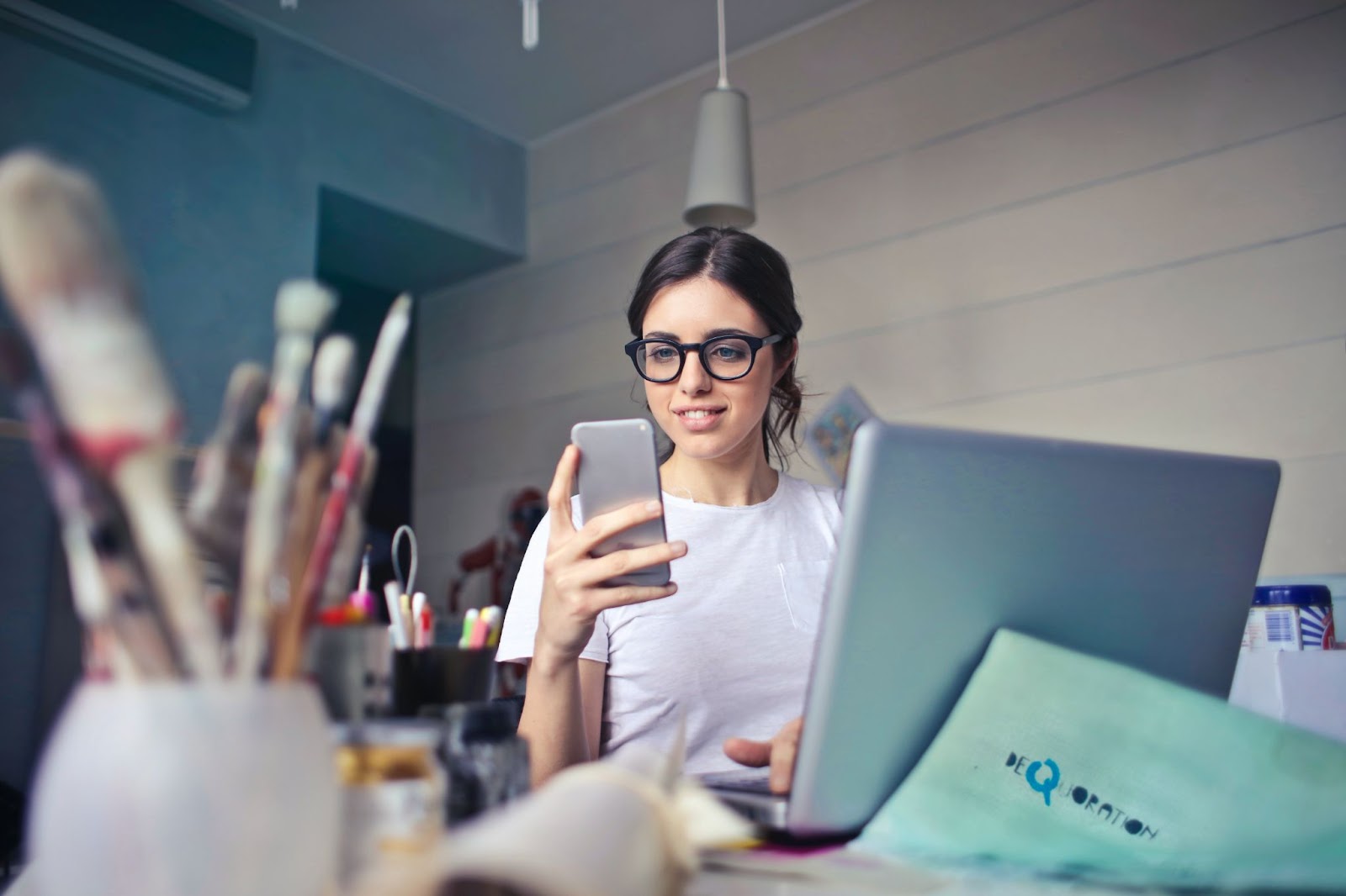 woman receiving sms marketing on her phone