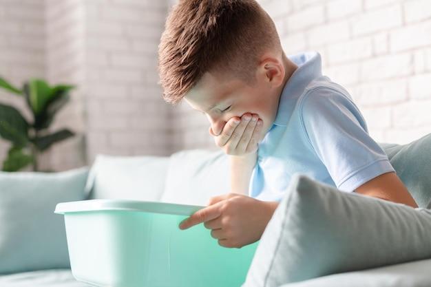 Premium Photo | Little boy feeling sick suffering of nausea vomiting food  poisoning concept