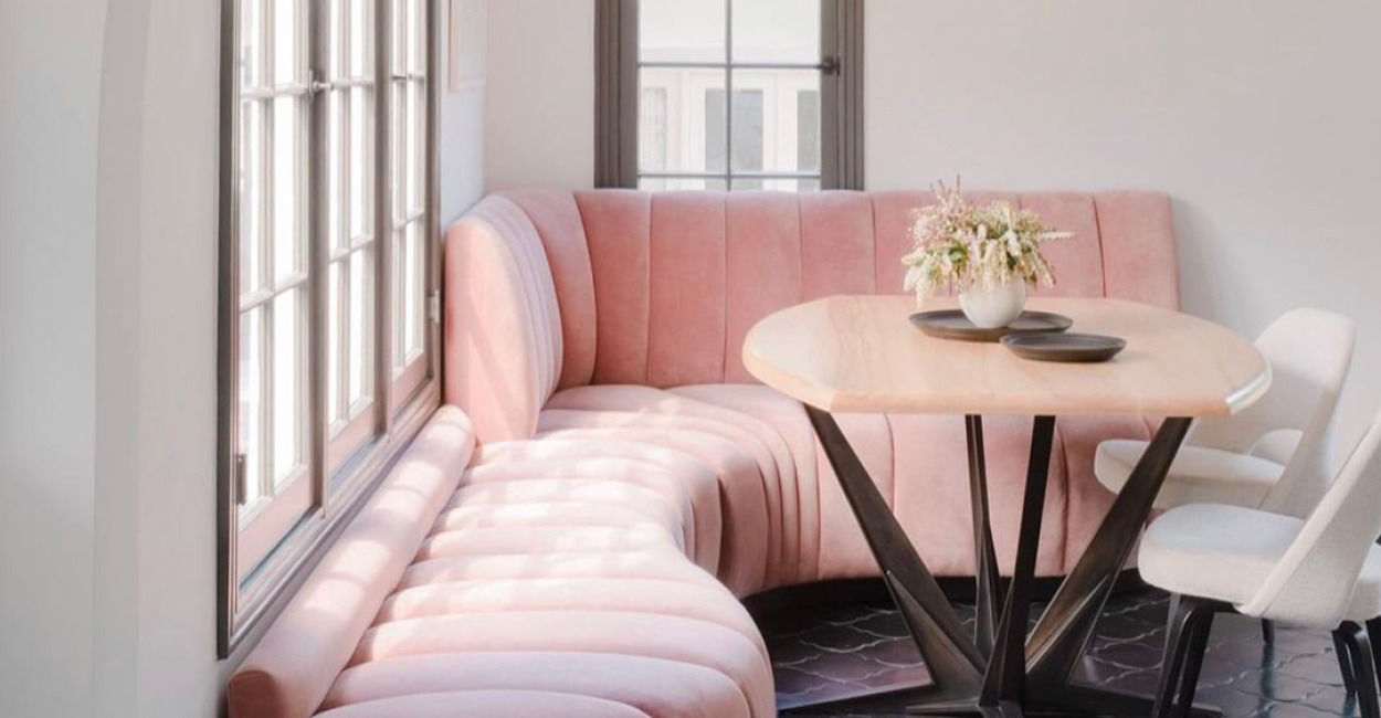 Roomy Breakfast Nook with a Bench and Chairs