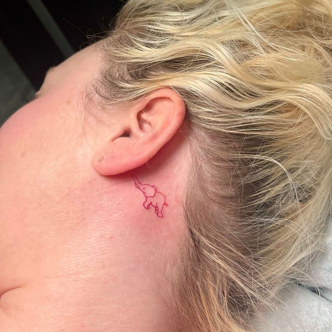 Cute Little Elephant Behind The Ear Tattoo