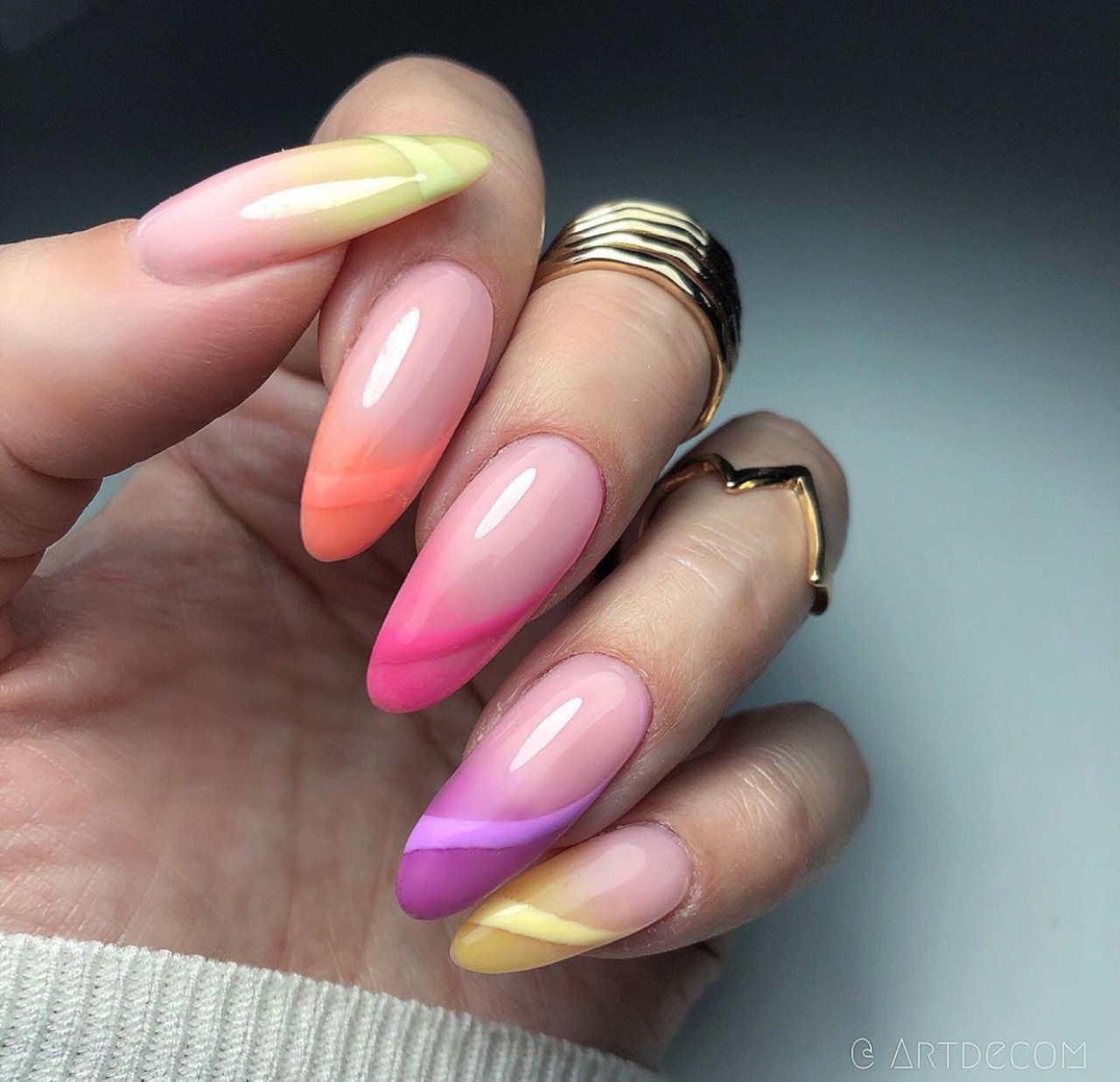 Bright pastel manicure on long, oval nails