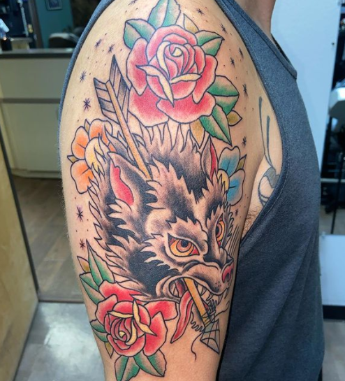 Dynamic Colorful Wolf Tattoo On Forearm