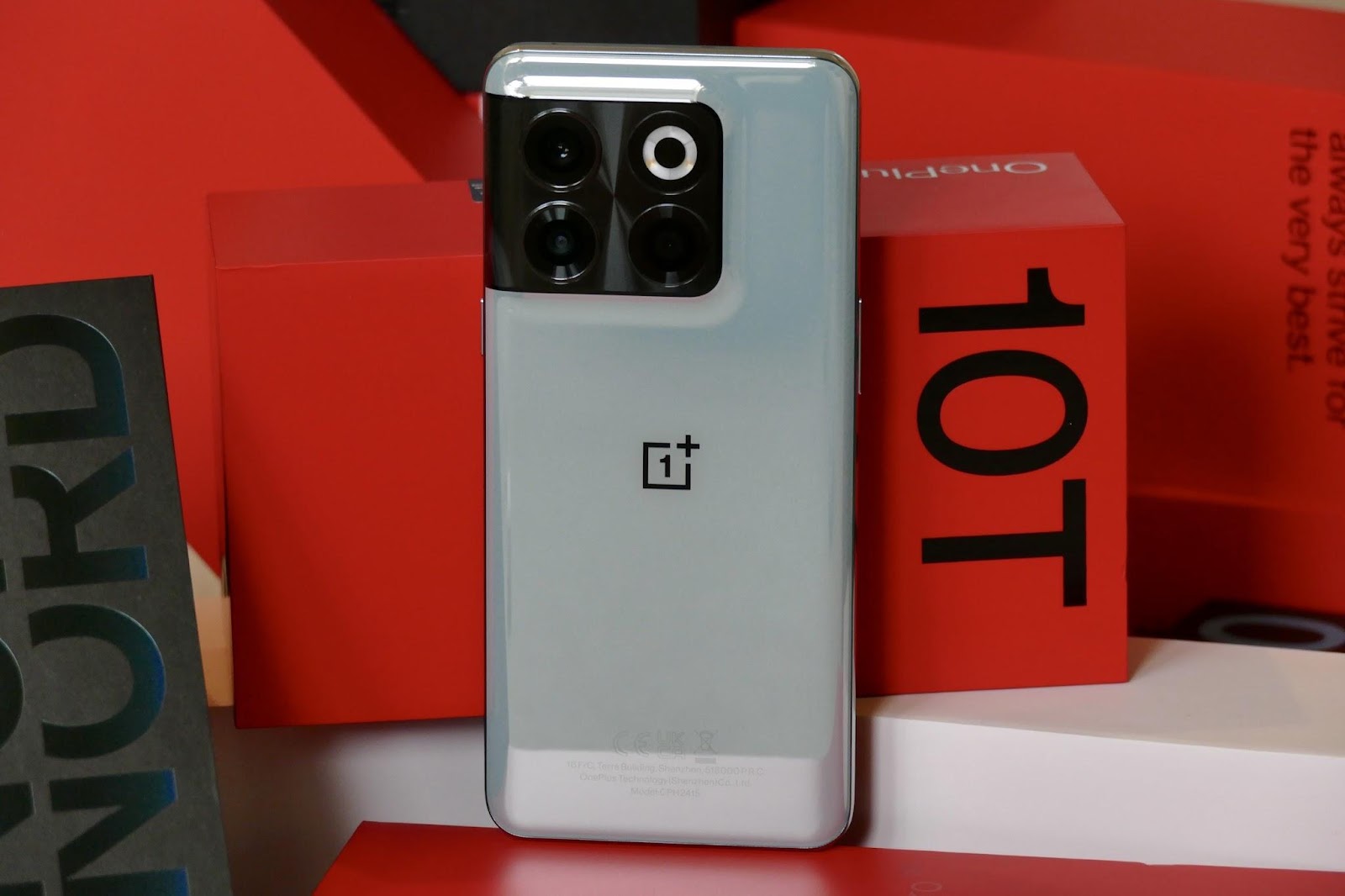 This image shows the OnePlus 10T with its box.