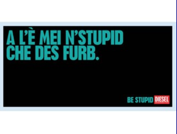 manifesto pubblicitario della campagna Be Stupid By Diesel con scritto in verde su sfondo nero "a l'è mei n'stupid che des furb" in dialetto torinese