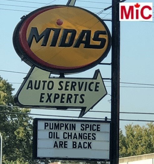 A Midas, auto service experts sign, with the custom letter sign saying “Pumpkin spice oil changes are back”