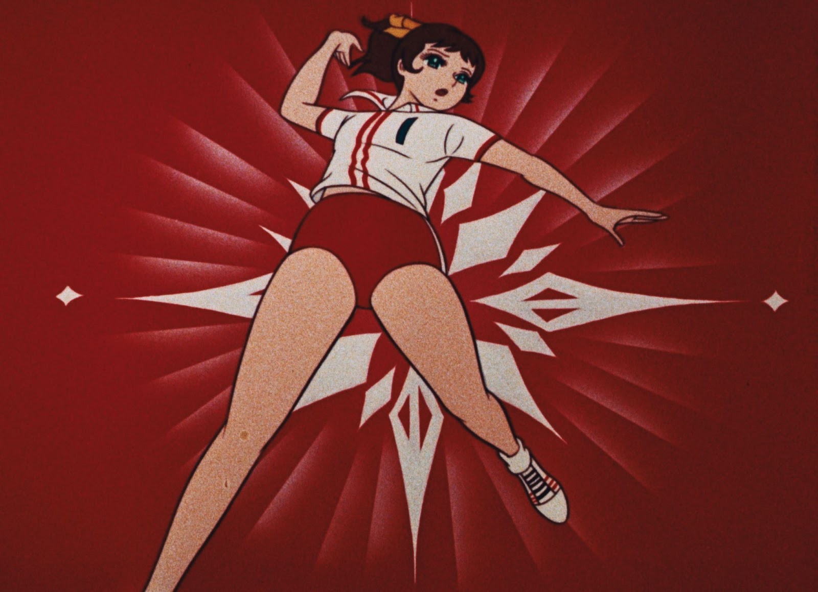 A screen still from The Witches of the Orient, featuring a scene from the original anime, depicting a female player jumping to spike a volleyball.