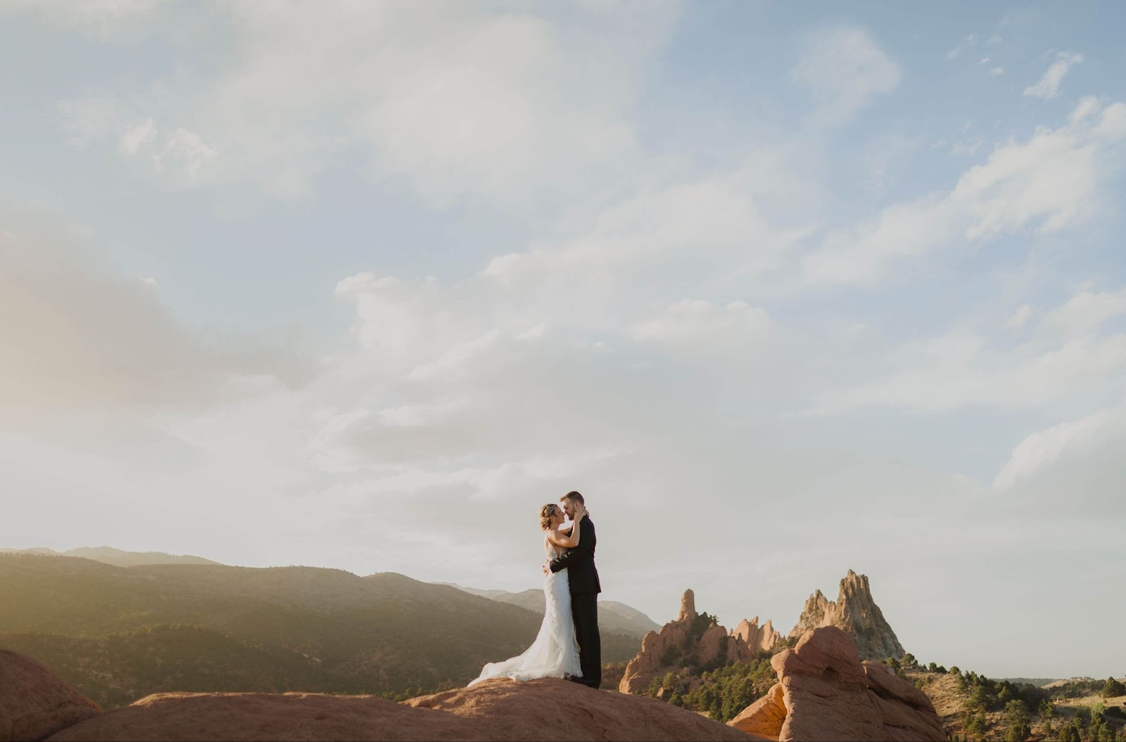 Couple hugging at elopement ceremony in Garden of the Gods