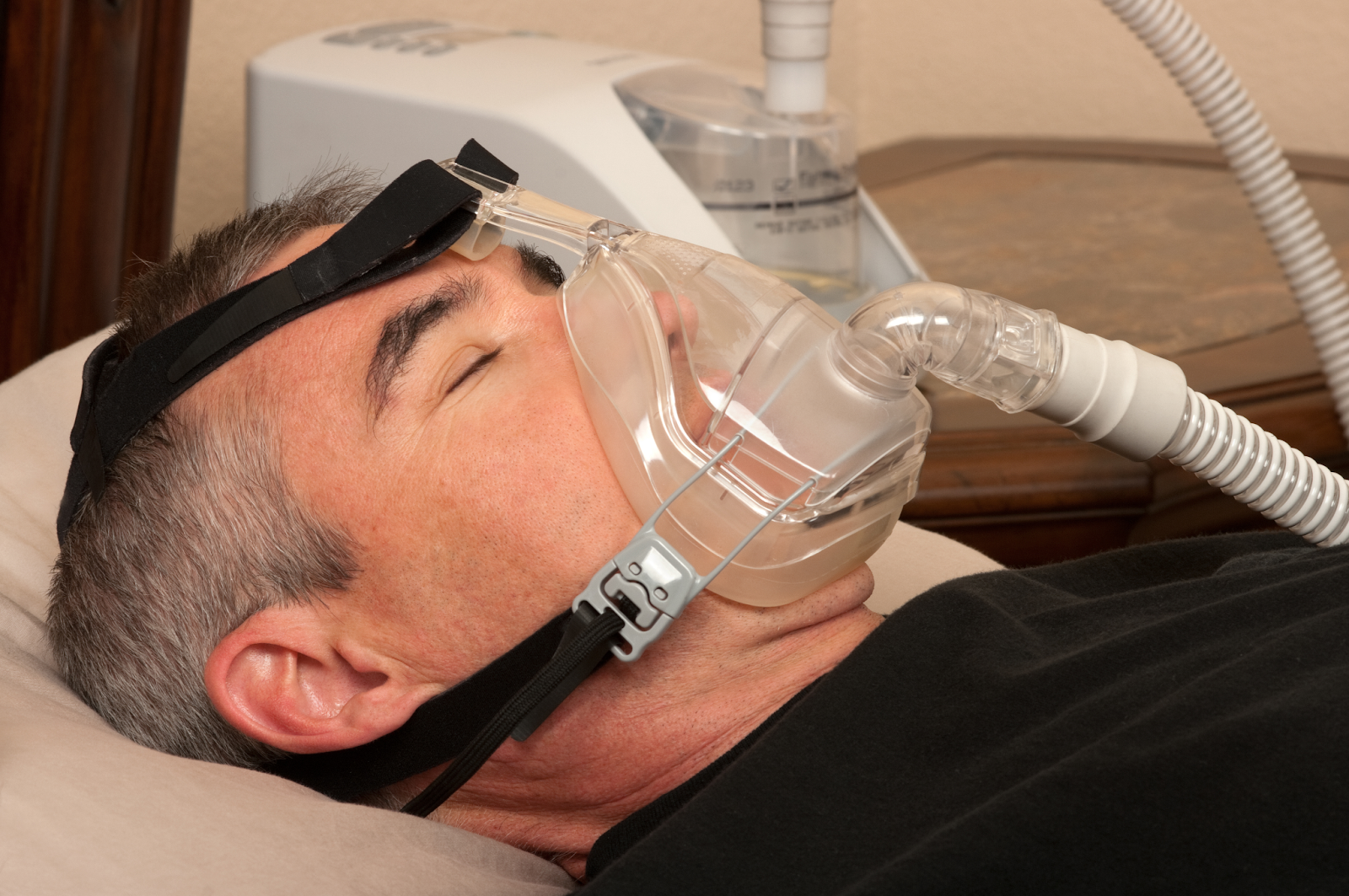 Man using a CPAP machine  