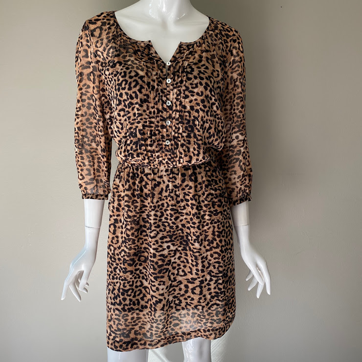 leopard print dress with black top underneath