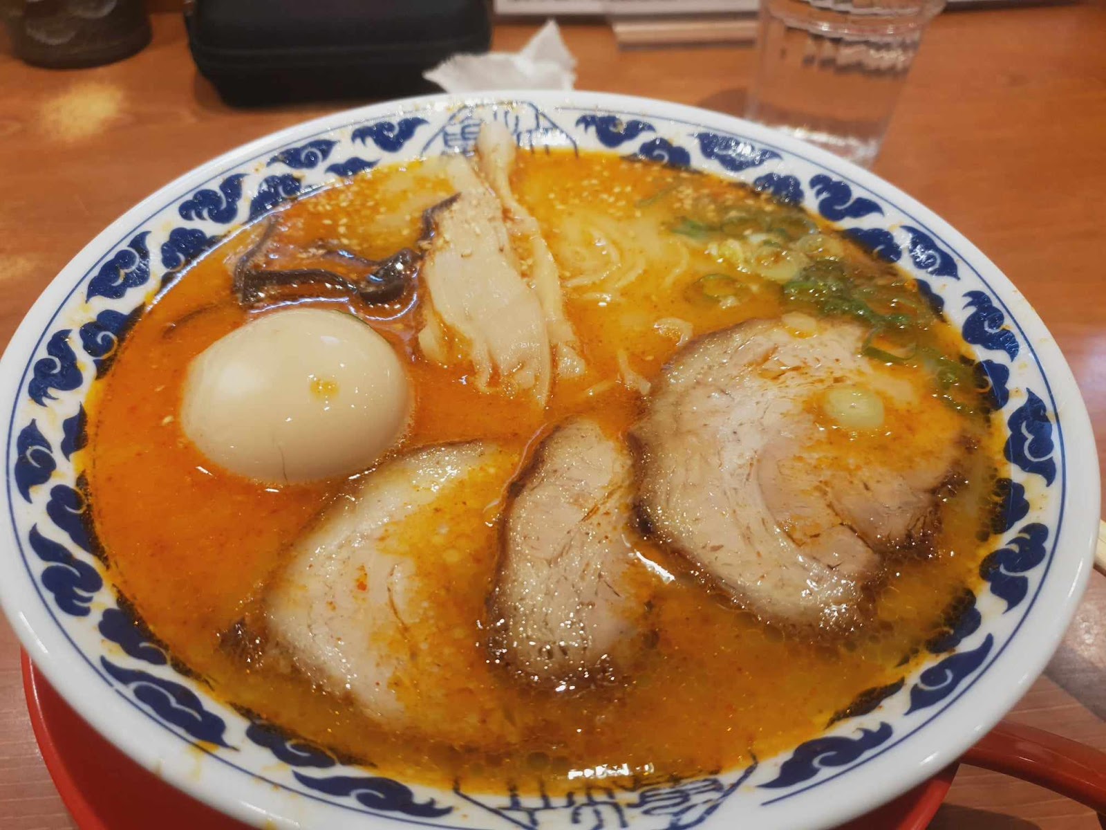 char siu slices and soft boiled egg on spicy Hakata ramen 