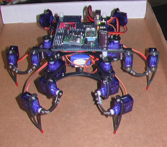 Mini Hexapod with 18 servos controlled by a Parallax Propeller board