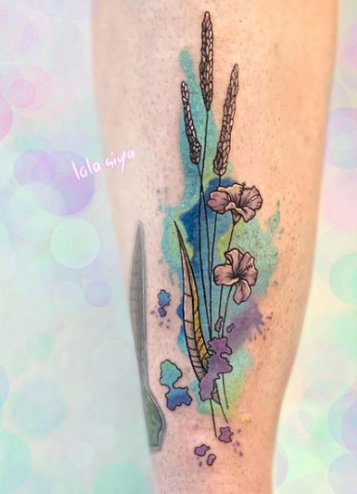 flower tattoo for leg