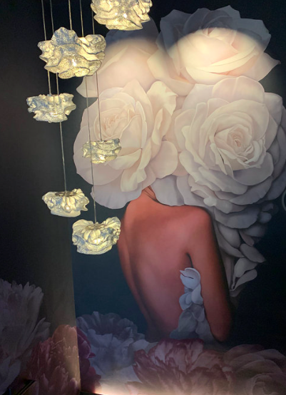  Woman in dress made of white roses, floral mural in Chicago 