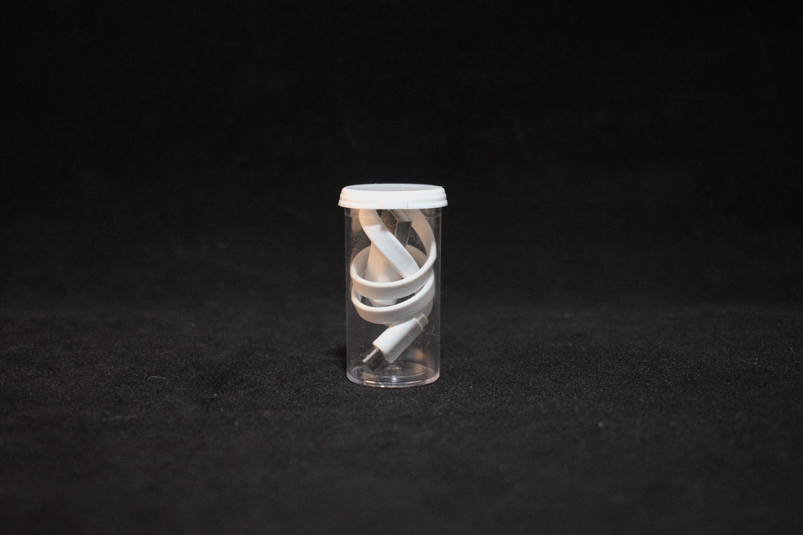 Coiled Charging Cord in a 5 Dram Vial