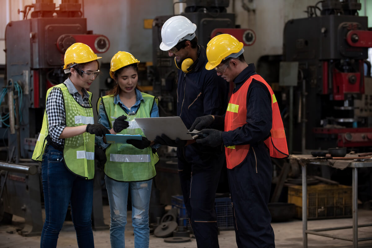 Engineers discussing something onsite