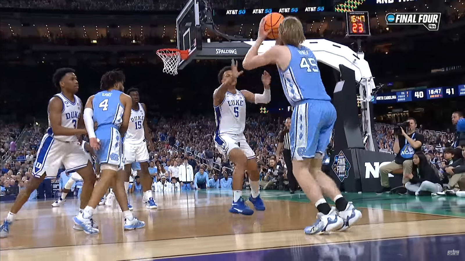 Brady Manek from UNC taking a jump shot in 2022's March Madness.