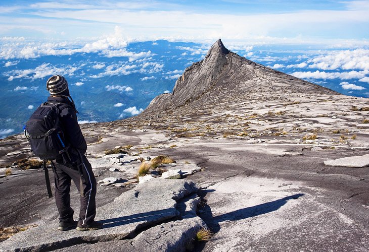 Hiker at the top of Mount Kinabalu
