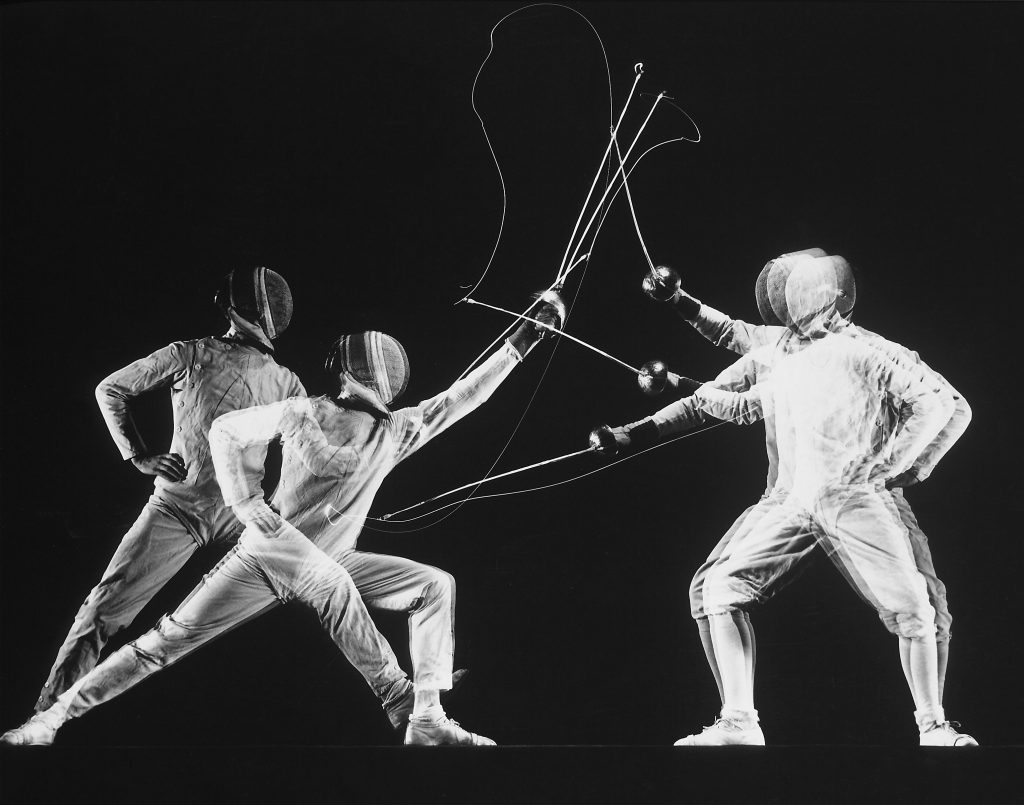 Stroboscopic image of New York University fencing champion Arthur Tauber (left) parrying with Sol Gorlin, 1942.