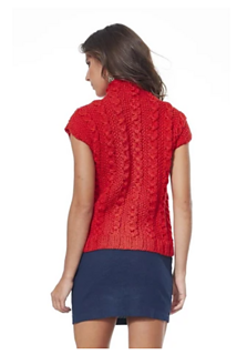 woman wearing a red cable knit vest