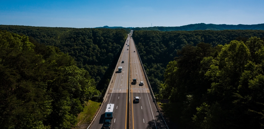 Freeway running through wooded area.