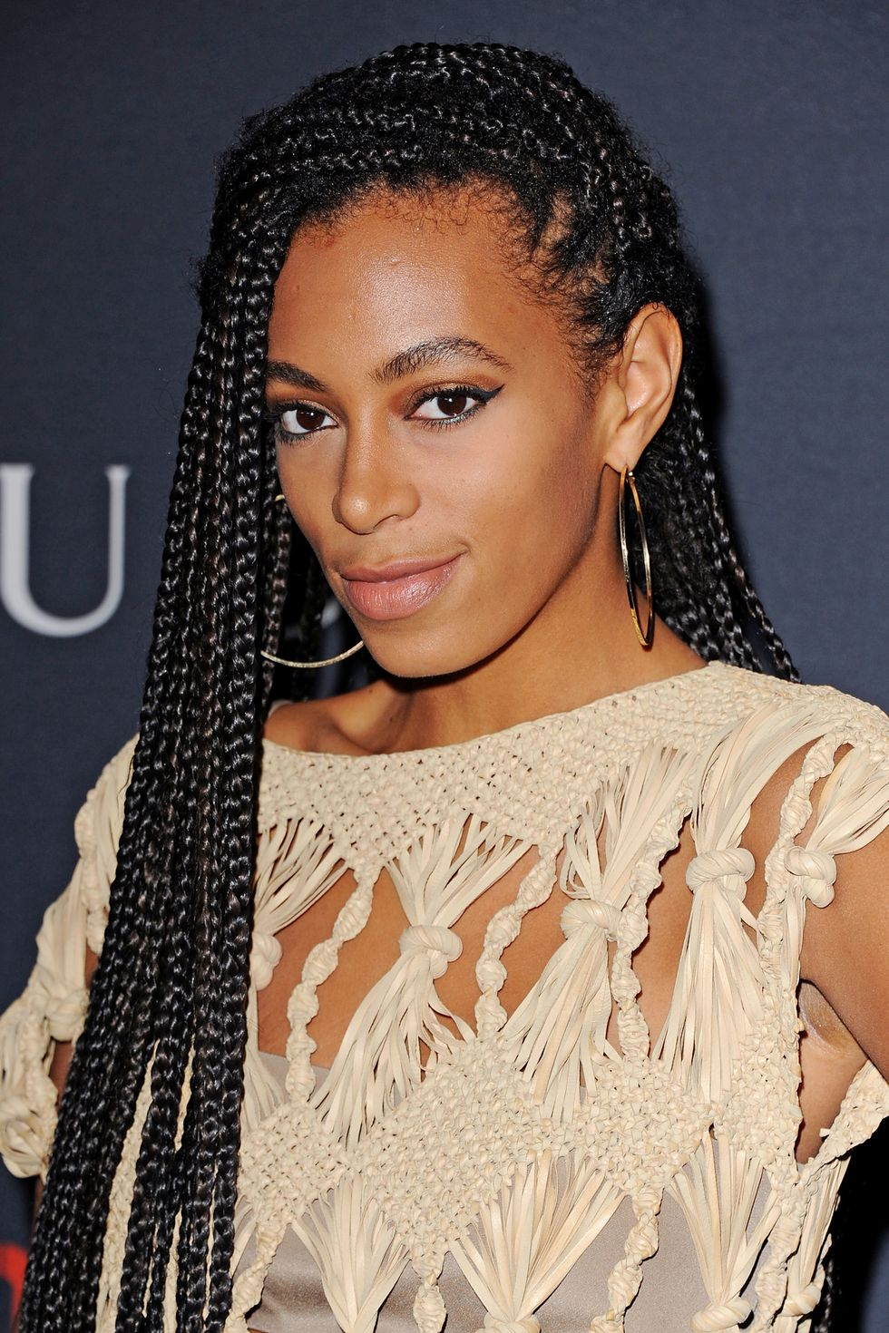 Get a bold look with swept-back box braids