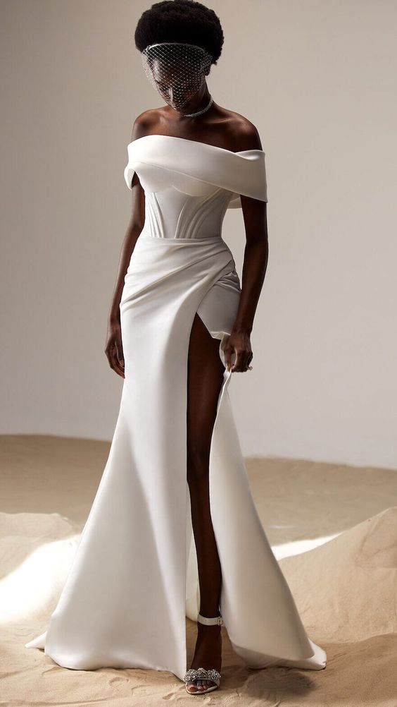 A lady wearing a sleek corset wedding gown