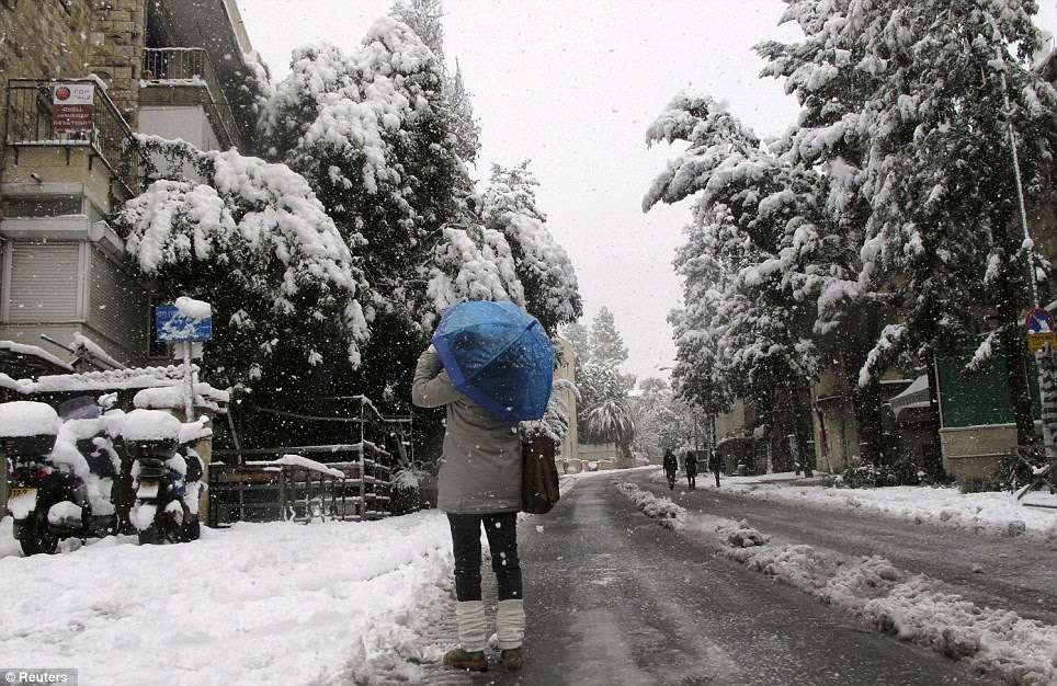 Public transport has ground to a halt after the unusual snowstorm hit Jerusalem