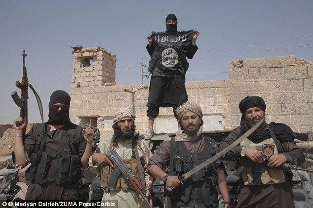 Waging war: The grievances of ISIS militants (pictured on the Syria-Iraq border) reach far back into history