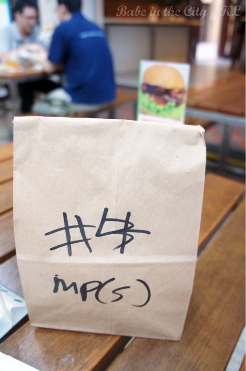 Bergs Burger inside paper bag