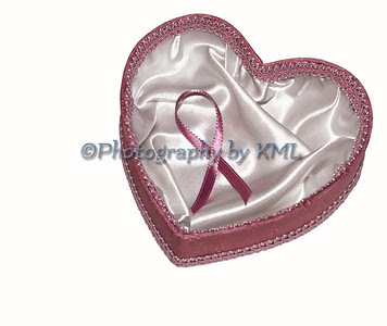 a pink heart with a breast cancer ribbon