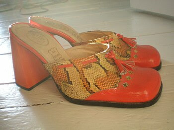 A pair of red mules (side)