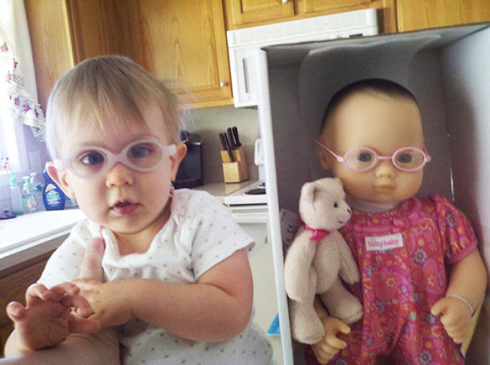Girl With Her Look Alike Doll