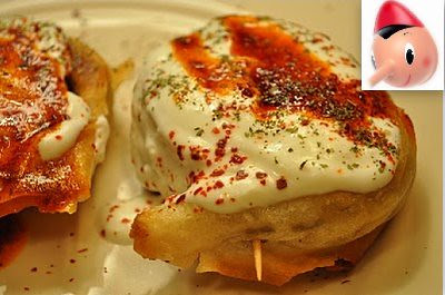kuzinede kizaran ekmek/.Manti
