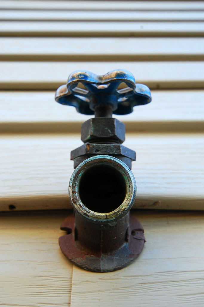 A hose faucet from below.