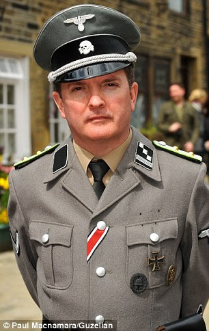 Visitors to a Second World War festival in Yorkshire caused outrage by turning up wearing Nazi uniforms