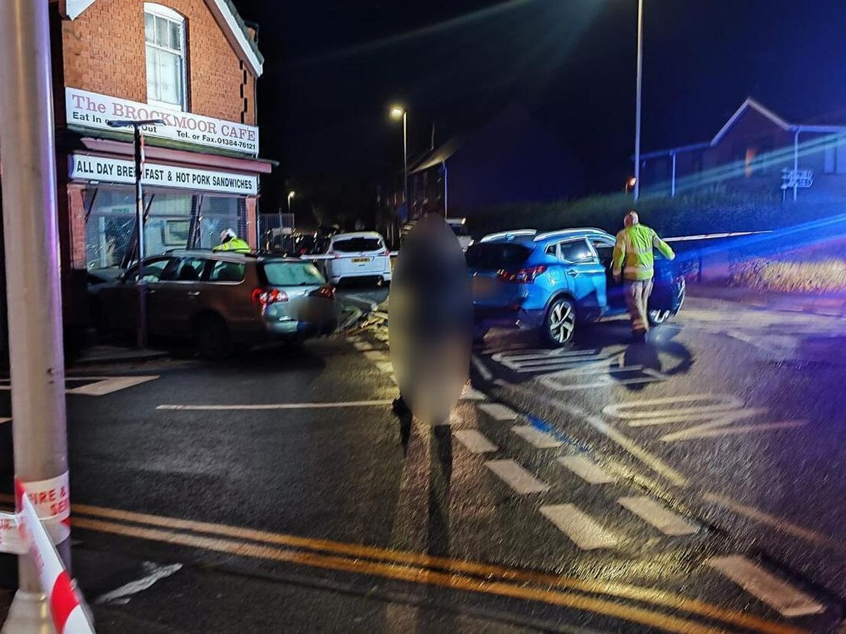 Two hurt in Dudley as car ends up lodged in café window after crash