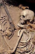 Skeleton with gun, from a ghost town in Wyoming