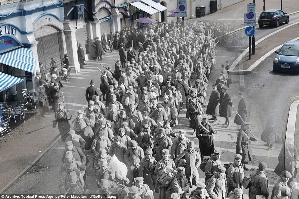 Then and now: German prisoners of war during the First World War on their way to Southend Pier in Essex in 1914 accompanied by guards and watched by locals