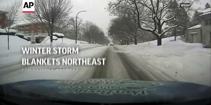 Winter storm blankets northeast US with snow, wind