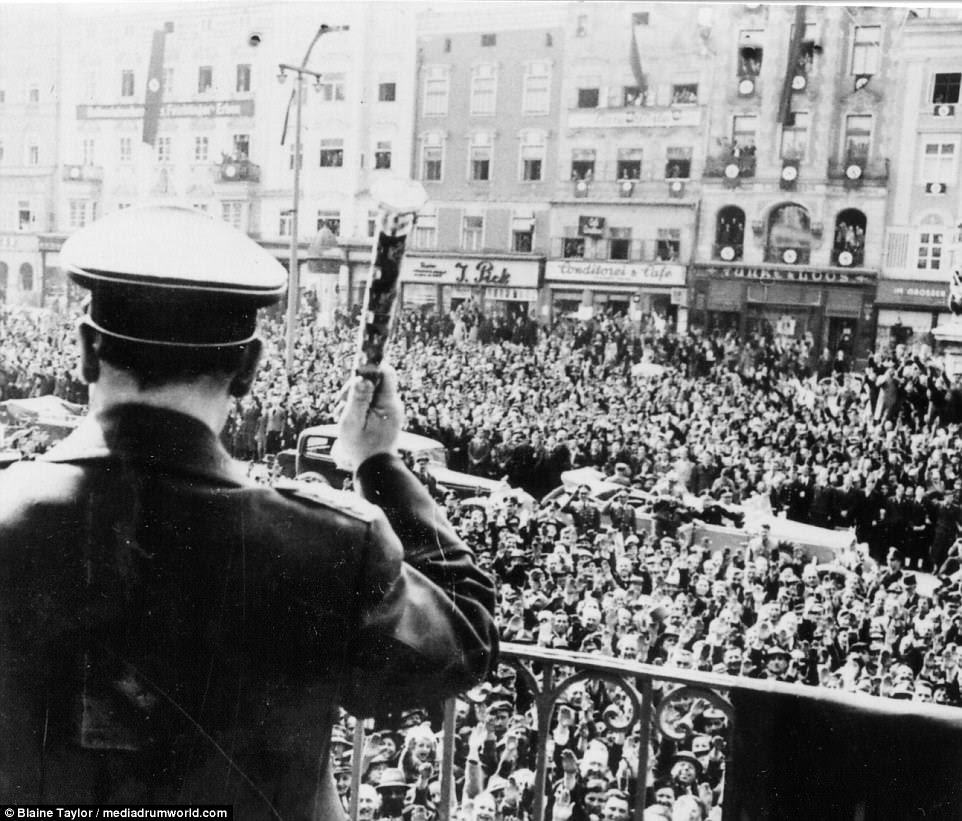 Field Marshal Goering salutes a happy crowd in Austria on 25 March 1938. His electoral swing through Austria took place during 25 March to 2 April 1938 and included Wels, Linz, Vienna, Wiener-Neustadt, Eisenerz, Graz, Bleiberg, Tamswegg, Mautenberg, Mauterndorf, and Salzburg