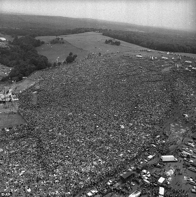 Peace and love: An aerial view of the concert grounds, where nearly half a million people crammed into the muddy fields for a weekend to create music history