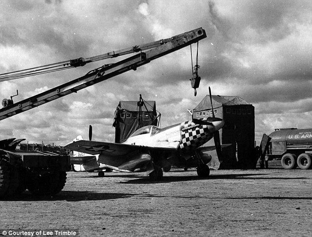 Key cover: A P-51D Mustang undergoing maintenance work
at Poltava air base, April 1945. The unit Trimble was assigned to was officially recovering damaged aircraft but in reality was keeping US men and materiel out of Soviet hands
