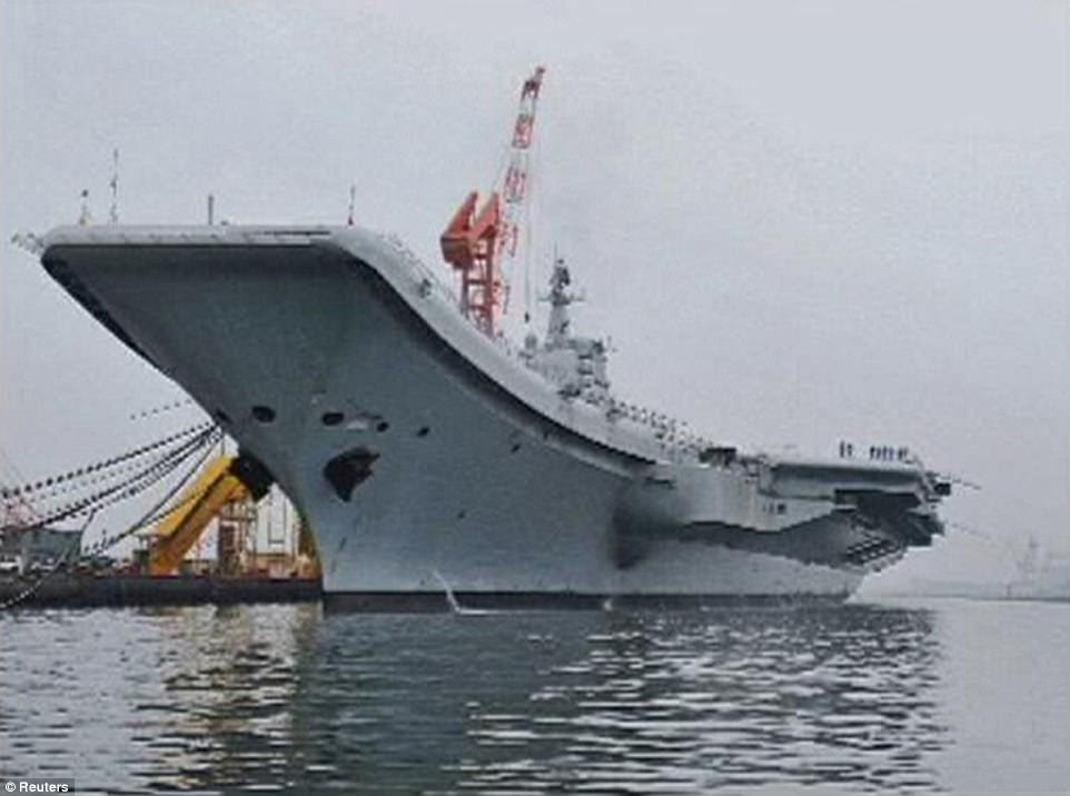Transformation: The ship has been overhauled and fitted out to become China's first aircraft carrier. This is how the former Soviet vessel looked in 2011