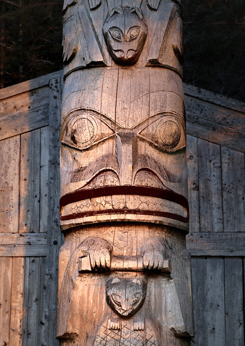 beaver figure of totem pole in front of Chief Son-i-Hat Whale House, Kasaan, Alaska