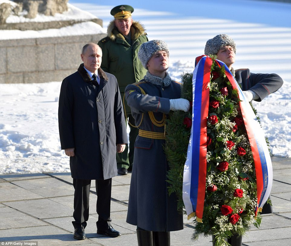 More floral arrangements:  Putin also laid a wreath at the eternal flame at the Battle of Stalingrad State Historical and Memorial Museum-Reserve on Mamayev Kurgan in Volgograd