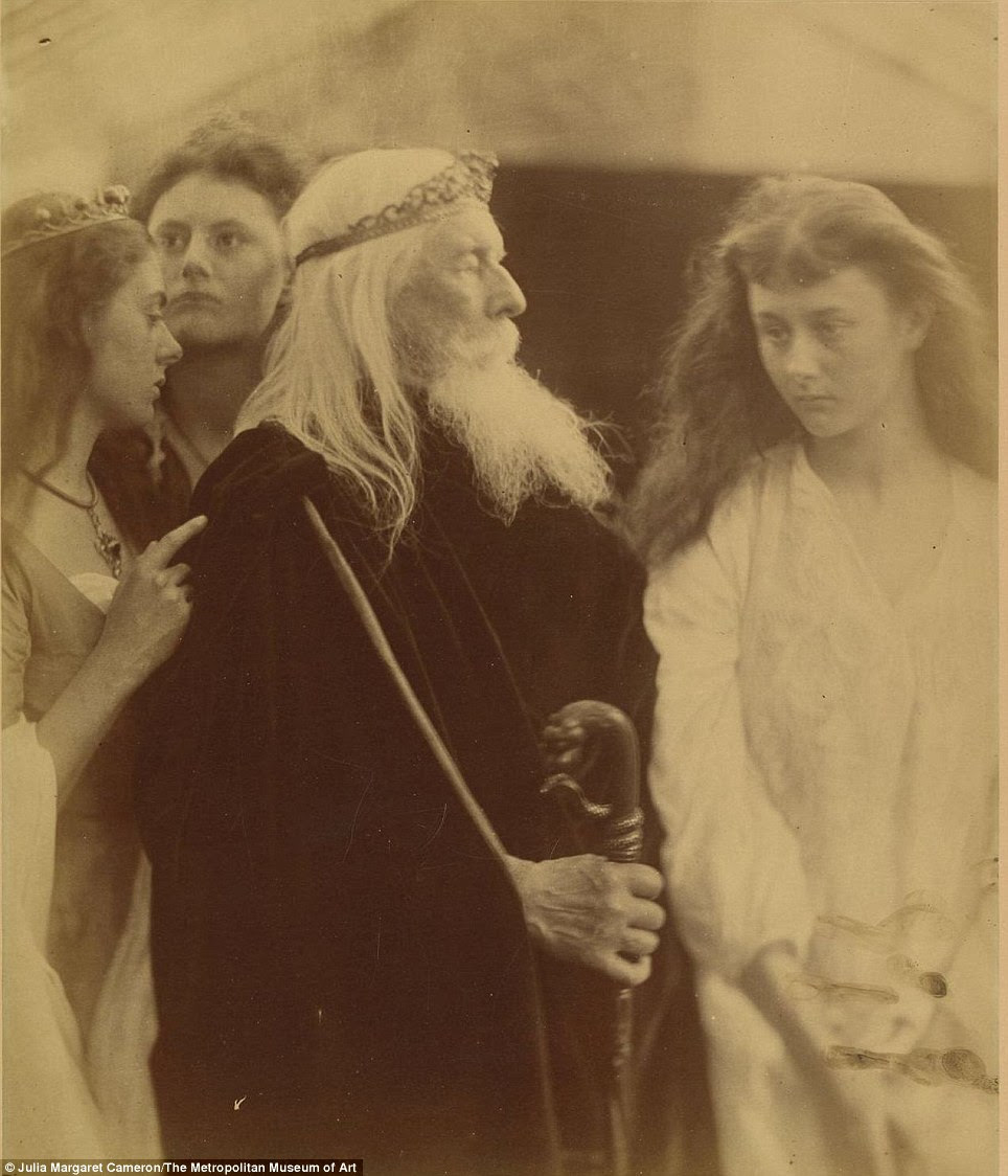 King Lear Alotting His Kingdom to His Three Daughters: The three Liddell sisters¿Lorina, Elizabeth, and Alice¿posed with the photographer¿s husband playing the tragically deceived King Lear in one of Cameron¿s few Shakespearean compositions