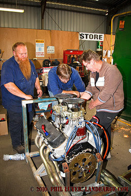 Mick Rumbold, Darrell Horley and Dexter Taylor sort out the fuel line plumbing on the big block Chev