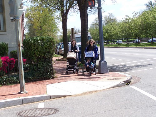 Two women with baby carriages, Pennsylvania Avenue and 9th Street SE